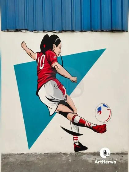 We proudly feature female athletes in our sports murals. This piece shows a female player executing a powerful kick, celebrating skill and strength in women's football.