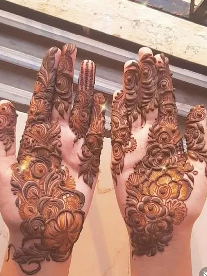 A very heavy and intricate design, perfect for a bride who wants maximum impact.