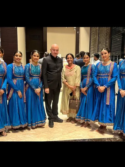 A group photo with the esteemed Anupam Kher sir and our team. It was a memorable evening performing at the Times Business Awards.