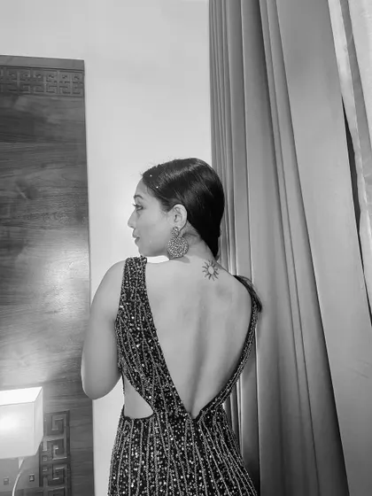 A black and white shot highlighting the beautiful back of the gown and my sun tattoo. It’s all about the details.