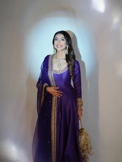 A full-length shot showing the beautiful flow of the Anarkali and the complete, polished look.