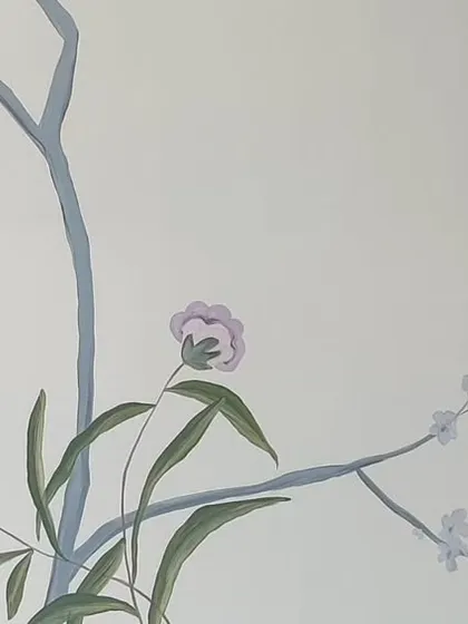 Detail shot of the French mural, showing a flying bird and butterfly near a switchboard, demonstrating how I integrate art around existing fixtures.