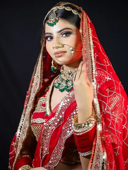 The complete look, showing how the makeup harmonizes with the rich colors of the lehenga and the heavy kundan jewelry.