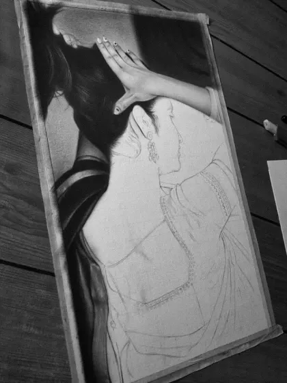 A duplicate of a progress shot of the Priyanka Mohan drawing, showing the contrast between the detailed hair and the outlined body.