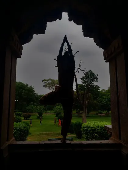 Finding my balance with Vrikshasana (Tree Pose) in this beautiful natural frame. Like a tree, yoga teaches us to be rooted yet reach for the sky.