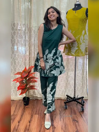 Our festive drop is here. This sleeveless dark green co-ord set with a bold white floral print is a stunning choice for any celebration.