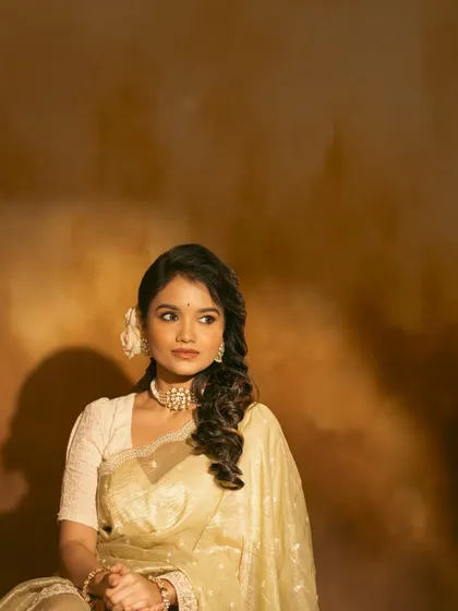 A collection of images from a retro-themed photoshoot with the beautiful actress Sanjana Tiwari. I created a soft, classic hairstyle with side-swept curls and floral accents to match the vintage aesthetic.