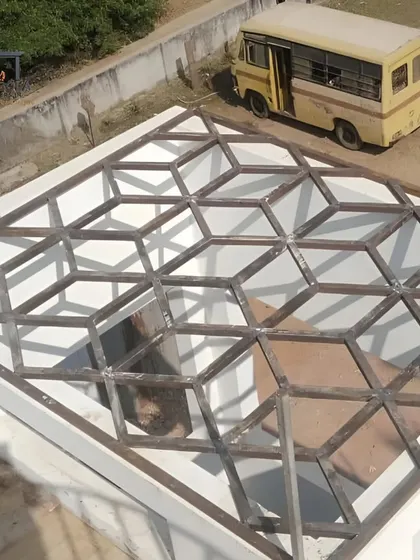 Here is the bare metal frame for a geometric skylight, showcasing the clean welds and precise angles of the underlying structure. This strong foundation is key to a durable and weather-proof installation.