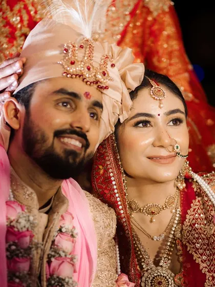 A candid moment of the happy couple during their wedding ceremony. The smiles and joy are what it's all about, and I design the setting to make these moments feel even more special.