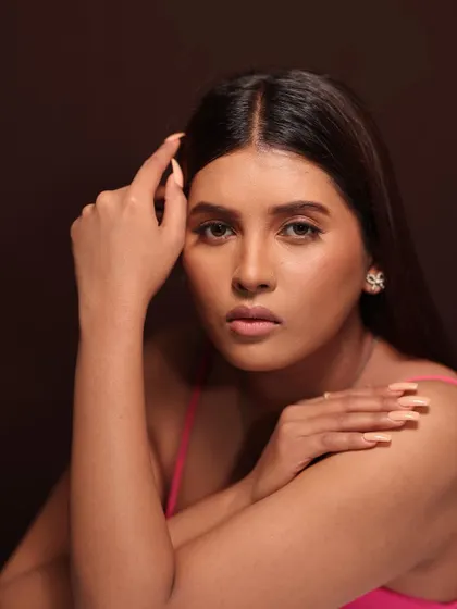 A direct and engaging portrait, showing how this makeup looks straight-on to the camera.