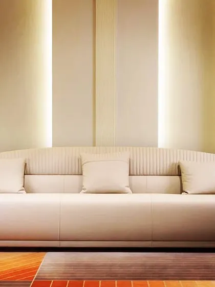 This sofa showcases an elegant and understated design. The clean, straight lines, subtle channel tufting on the back, and a neutral color palette make it a versatile piece that can blend seamlessly into a calm and minimalist living space.