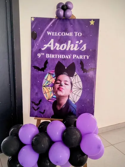 A welcome sign for the Wednesday themed 9th birthday party.