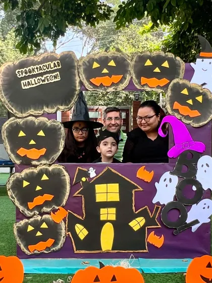 A family of four gets into the Halloween spirit with their creative costumes. It was wonderful to see so many families participating in our festive workshop.