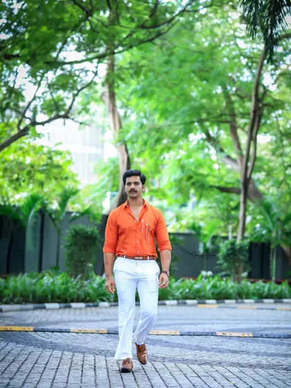 A full-length shot of Rohit's stylish outfit for the awards party. The grooming I provided ensures he looks sharp from head to toe.