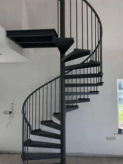 The complete steel structure, including the handrail and spindles, installed and ready for the final finishes.