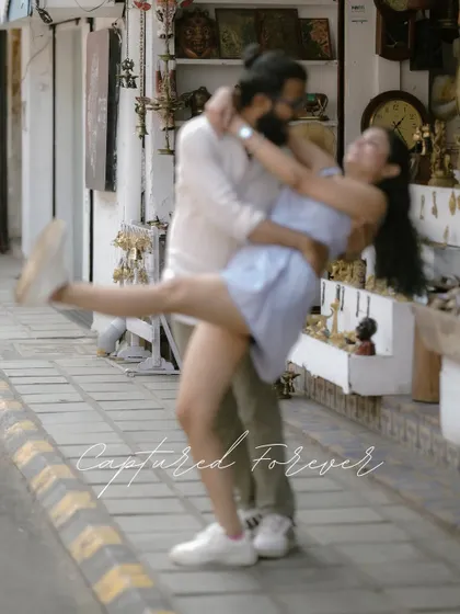 A whirlwind of love and motion. This playful, slightly blurred shot from a post-wedding shoot in Kochi captures the carefree spirit of the couple.