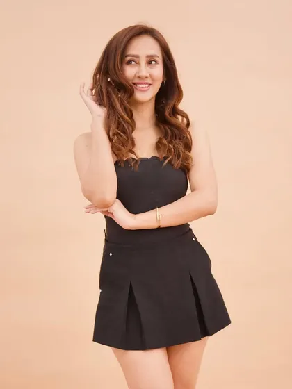 A full-length shot from the Choco Chic photoshoot, showing how a rich brunette color can be both elegant and modern.