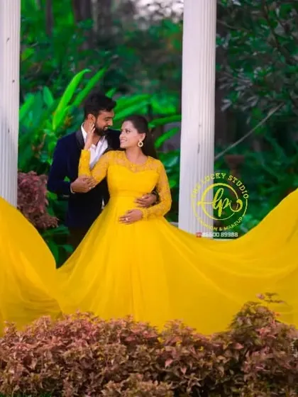 Another beautiful composition using the yellow gown's trail to frame the couple. My styling service includes on-set assistance to get these perfect shots.