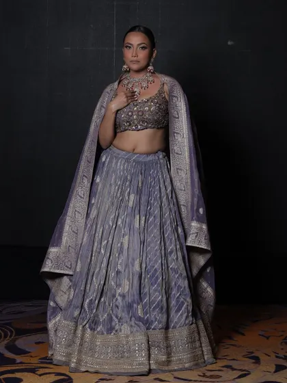 A confident pose showcasing the complete look.