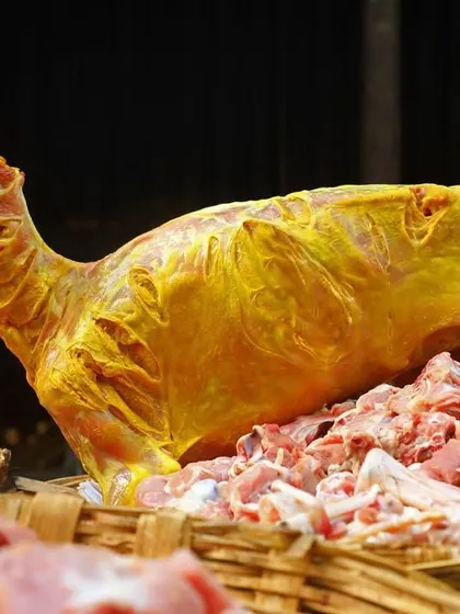 Preparing the mutton for our Raja Virundhu. We use only the best quality, 100% Halal meat, marinated in our special family recipe spices before roasting.
