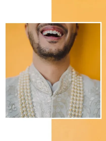 A duplicate of 304, another frame capturing the groom's infectious smile.