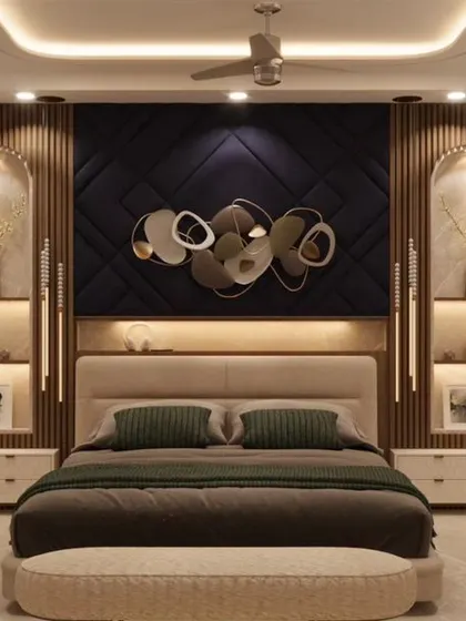 Dive into the ocean of luxury with this 3D bedroom design. It features a stunning back-lit accent wall with cushioned panels, built-in display niches, and modern wall art.