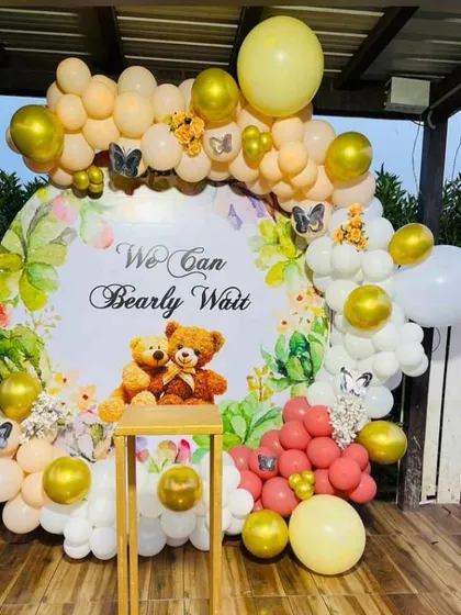 Another "We Can Bearly Wait" teddy bear themed baby shower, this time with a softer color palette of peach, white, and gold balloons.