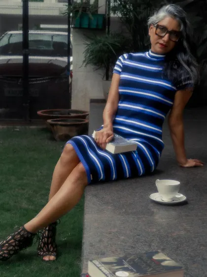 I love a good themed shoot. This 'Geeky Girl' concept, with a striped bodycon dress and classic books, shows my playful side and my ability to step into a character for a creative campaign.