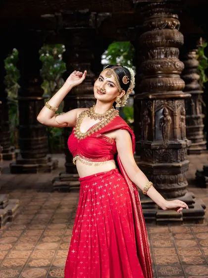 Another beautiful pose from this series. The antique gold jewellery shines, adding a touch of royalty to the entire ensemble.