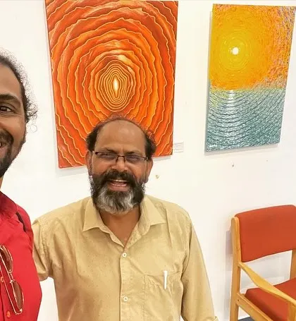 With one of the esteemed guests at the conference.