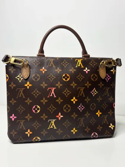 The other side of the custom LV bag, where I painted some of the monograms in a beautiful gradient of colors.