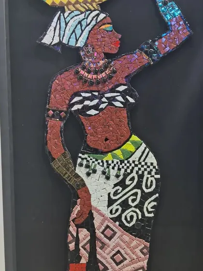 A mosaic artwork from Egyptian artist Nagla, showcasing her incredible skill in creating detailed figures and scenes. Her work brings together influences from the Middle East and beyond.