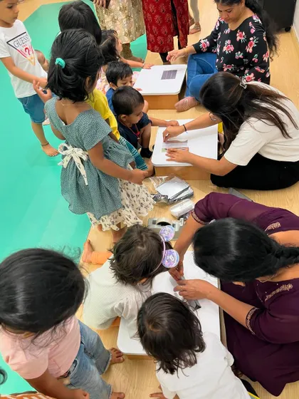 Each activity, from making Bhel Puri and toast to plucking methi leaves and exploring what floats, is a lesson in itself. These practical life and sensorial activities are central to the Montessori method, helping children develop fine motor skills, concentration, and a deep understanding of the world through their own actions.