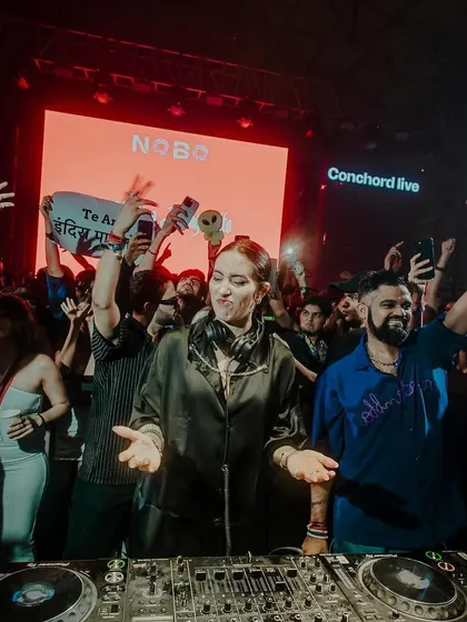 On the decks with Indira Paganotto, surrounded by an adoring crowd. Hosting her India tour was a massive project and an incredible experience.