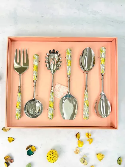 Our six-piece serving spoon set, with its vibrant green and yellow printed handles, takes your dining experience to the next level. It comes in our signature gift box, making it a perfect present.