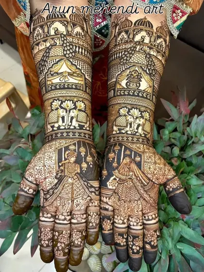 A grand and royal design featuring bride and groom portraits, elephants, and palace architecture.