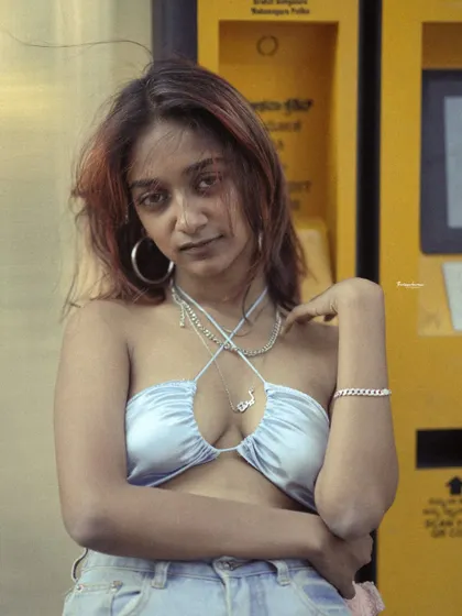 An edgy fashion portrait taken on Church Street, Bangalore. The direct gaze and urban setting give this image a bold and contemporary attitude.