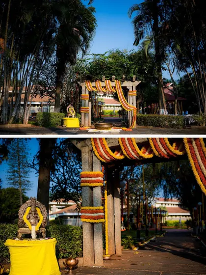The grand entrance to a wedding venue, decorated with traditional marigold garlands, setting a festive and welcoming tone.