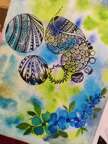 A small watercolor and ink piece I created. I often experiment with zentangle patterns and watercolor washes on paper.