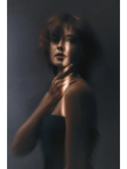 A soft, painterly portrait created with the Sigma 30mm lens. This demonstrates the lens's versatility, able to produce both sharp commercial images and soft, artistic portraits.