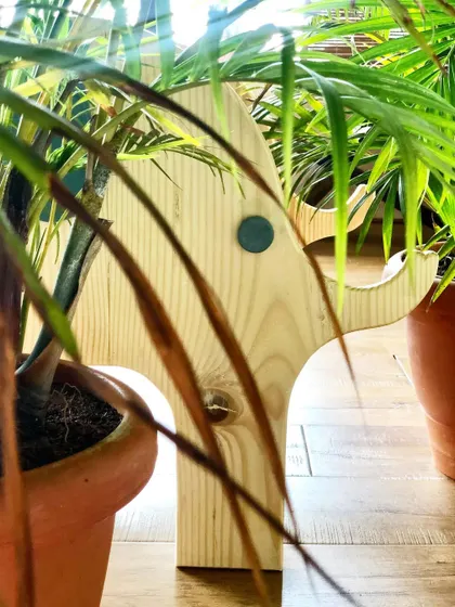 A playful peek at the elephant chair hiding in the plants. I love creating furniture that sparks imagination and becomes part of your child's games.