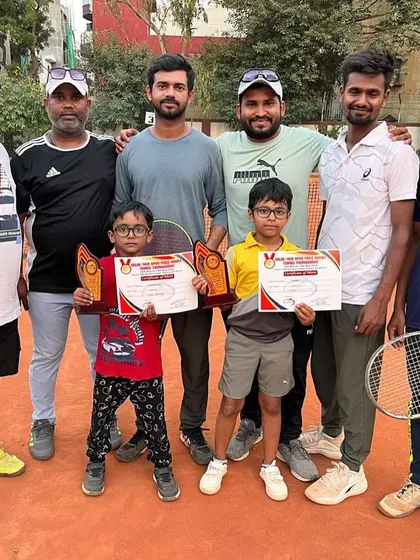 The winning brothers, Adhyant and Adhyayan, with the coaching team. It takes a team effort to produce champions, and we celebrate every victory together.