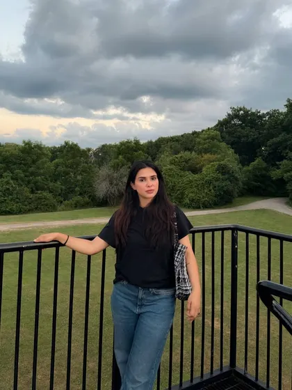 A throwback to a day out in a park in Ontario, wearing a simple black tee and jeans.