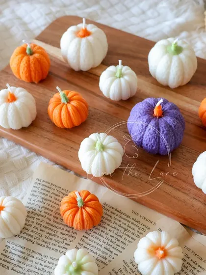 A patch of my mini pumpkin candles. The variety of colors and shapes makes them perfect for creating a festive autumn display.