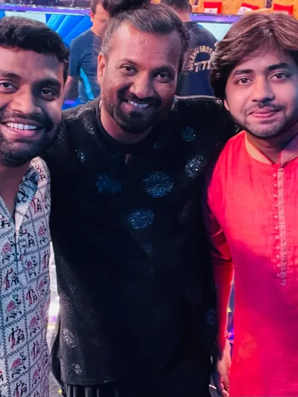 Sharing a frame with talented fellow musicians on the 'Saregamapa' set. The camaraderie behind the scenes is a huge part of what makes these shows special.