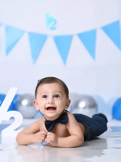 A big, happy smile for the camera! Celebrating six months of growth and happiness.