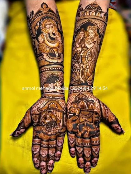 A divine-themed bridal mehendi with a portrait of Lord Ganesha on one arm and Radha-Krishna on the other. This is for the bride who wants her mehendi to be a symbol of her faith.