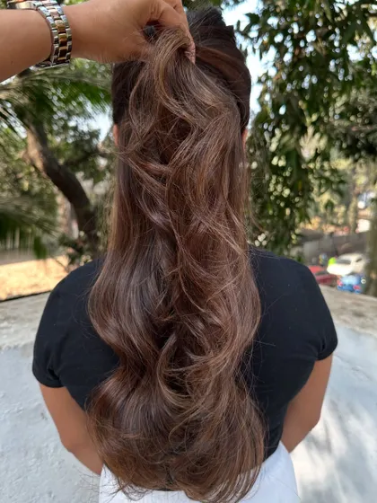 The ponytail view of the 'Hazelnut Chocolate Truffle' hair.
