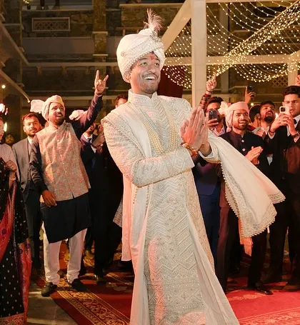 The groom's happy and energetic entry. A grand entrance isn't just for the bride; we make sure the groom gets his hero moment too.