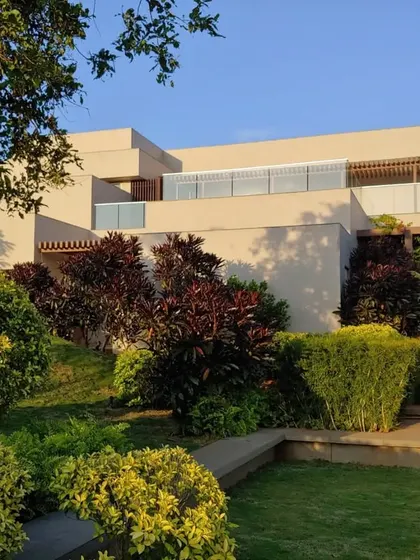 The "House in the Hills" project in Aamby Valley, nestled among lush, multi-level landscaping. Our design works with the terrain to create a home that feels like a natural extension of the environment.
